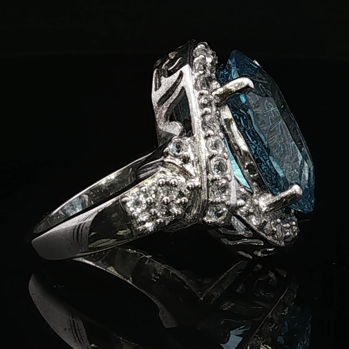 Winifreda Sterling Silver Blue Topaz Halo Ring