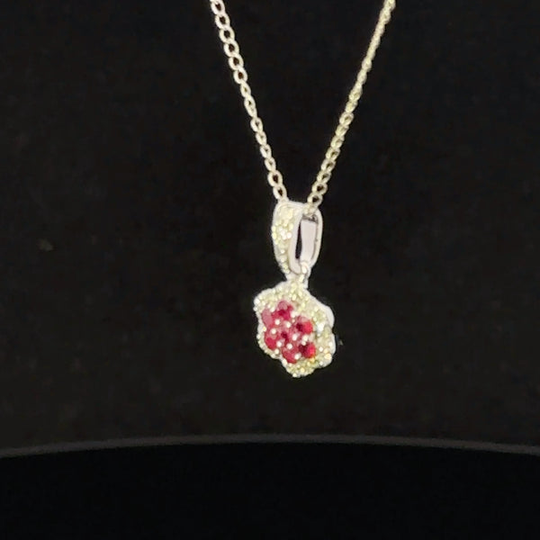 Elegant red ruby and diamond flower necklace by Veleska Jewelry