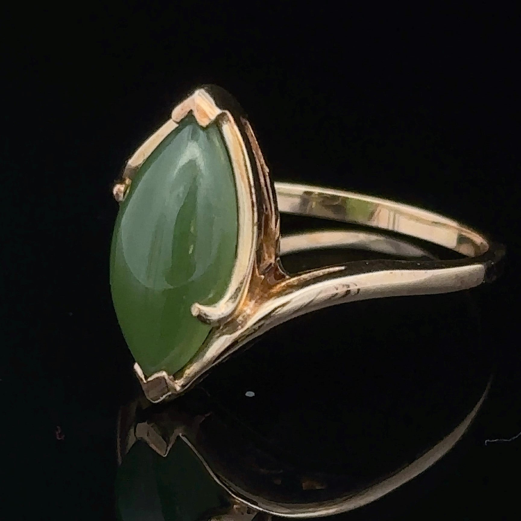 Close-up of marquise jade centerpiece in size 6.5 ring
