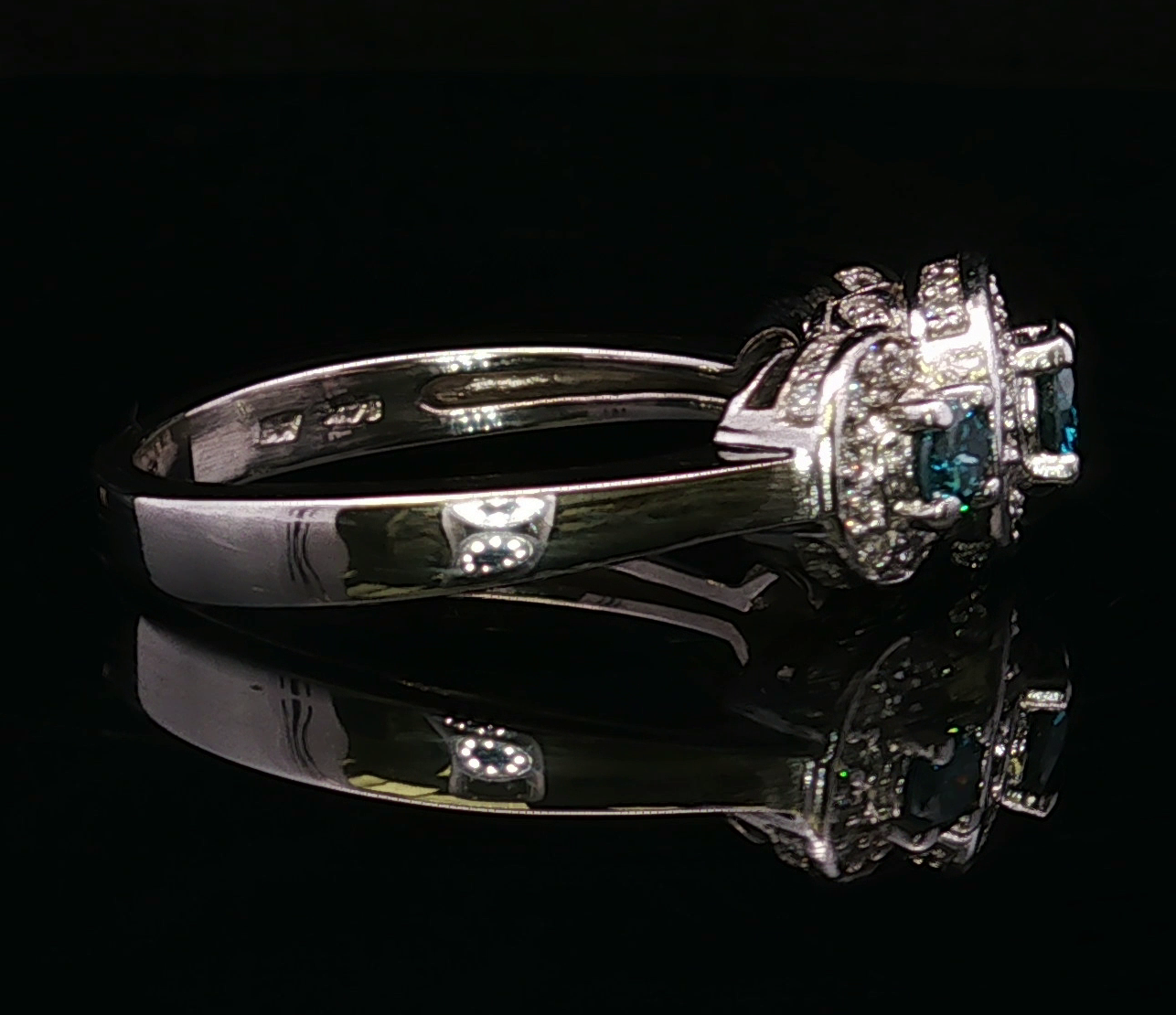 Celineas 14KW Blue & White Diamond Three Stone Ring