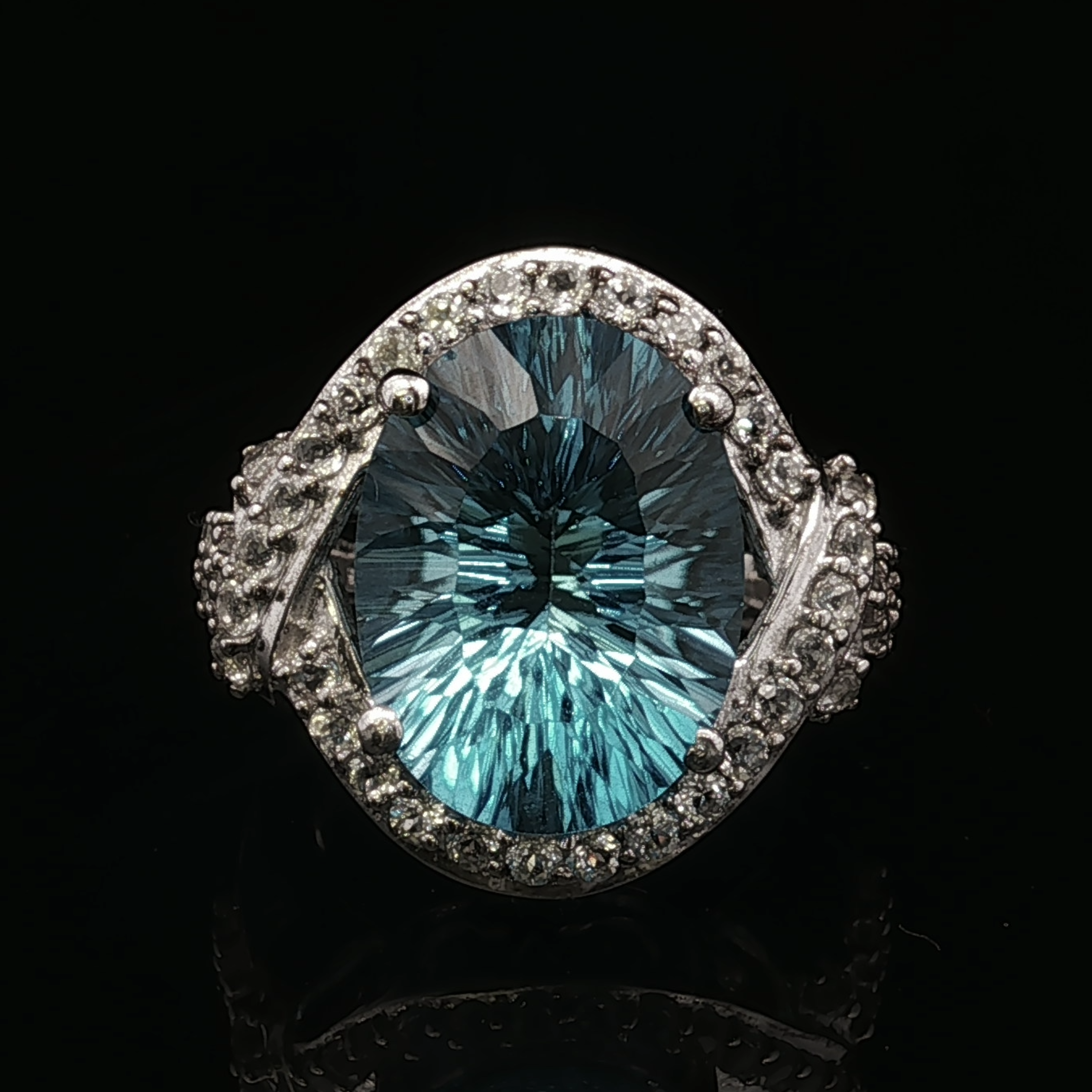 Winifreda Sterling Silver Blue Topaz Halo Ring