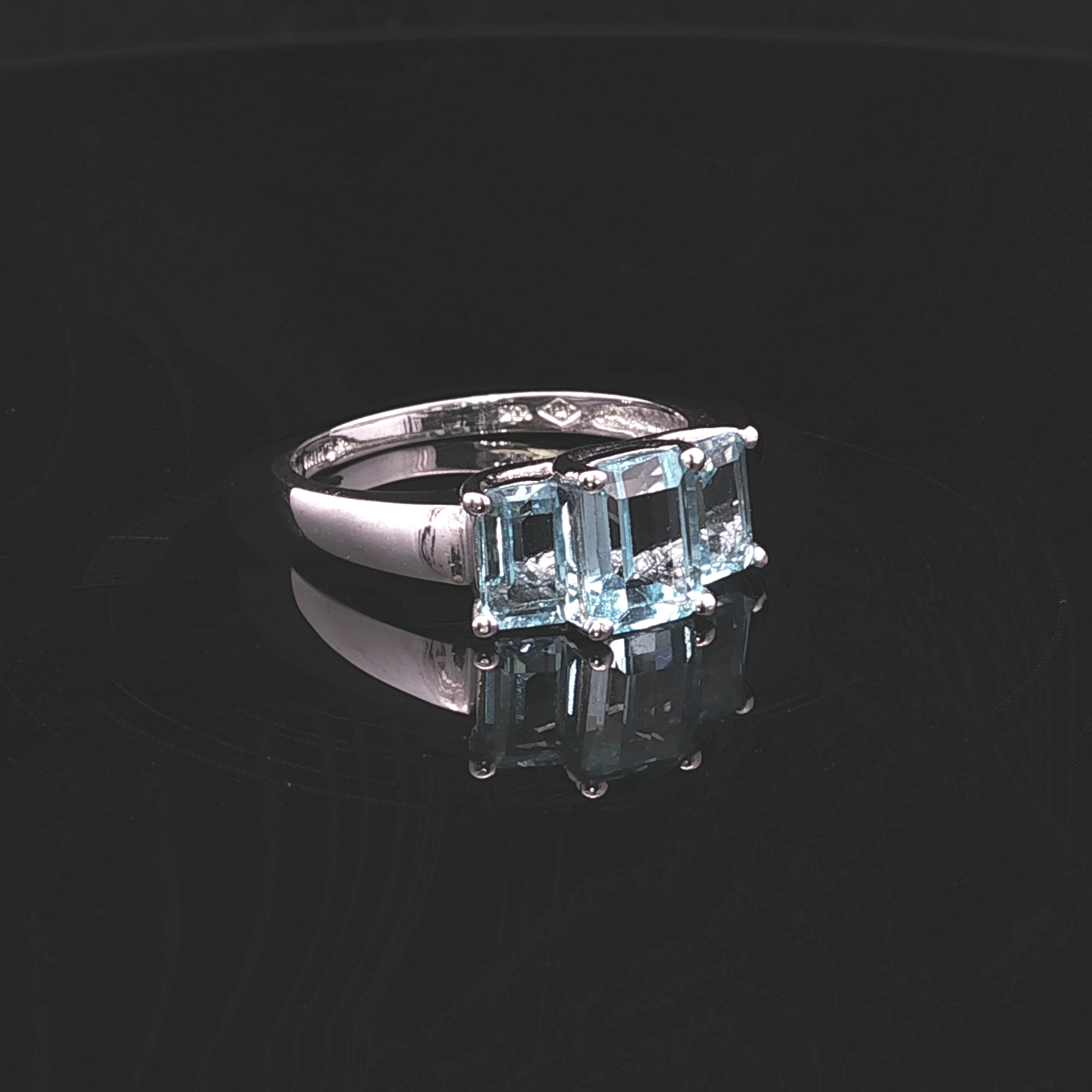 Emerson 10K White Gold 3-Stone Emerald Cut Blue Topaz Ring