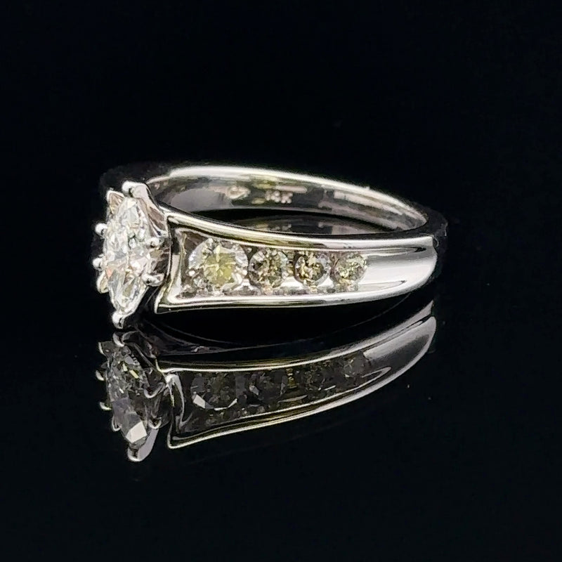 Close-up of Adeline Ring showing the 0.70cttw round side diamonds.