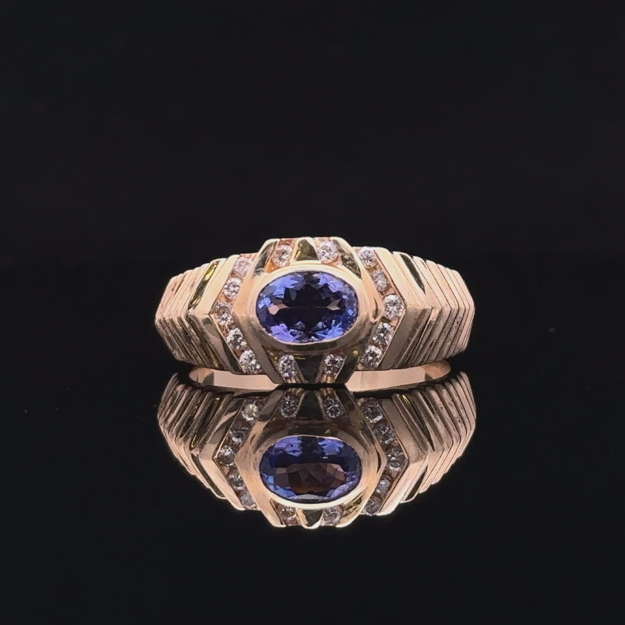 14K yellow gold ring with bluish-violet gemstone