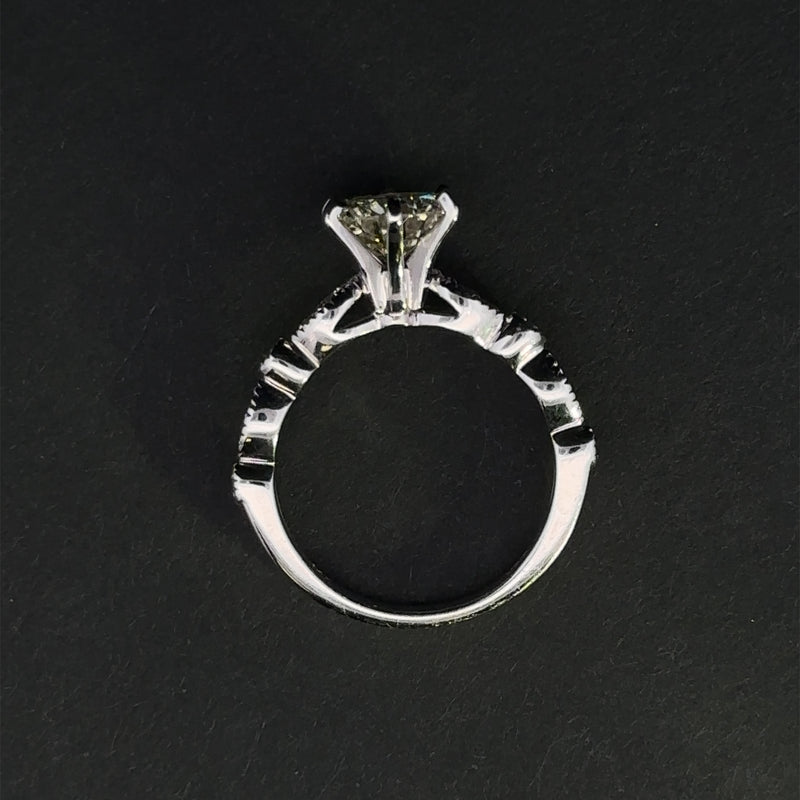 Elegant design of Nylah Ring, highlighting the blend of center diamond and side stones, size 5.5.