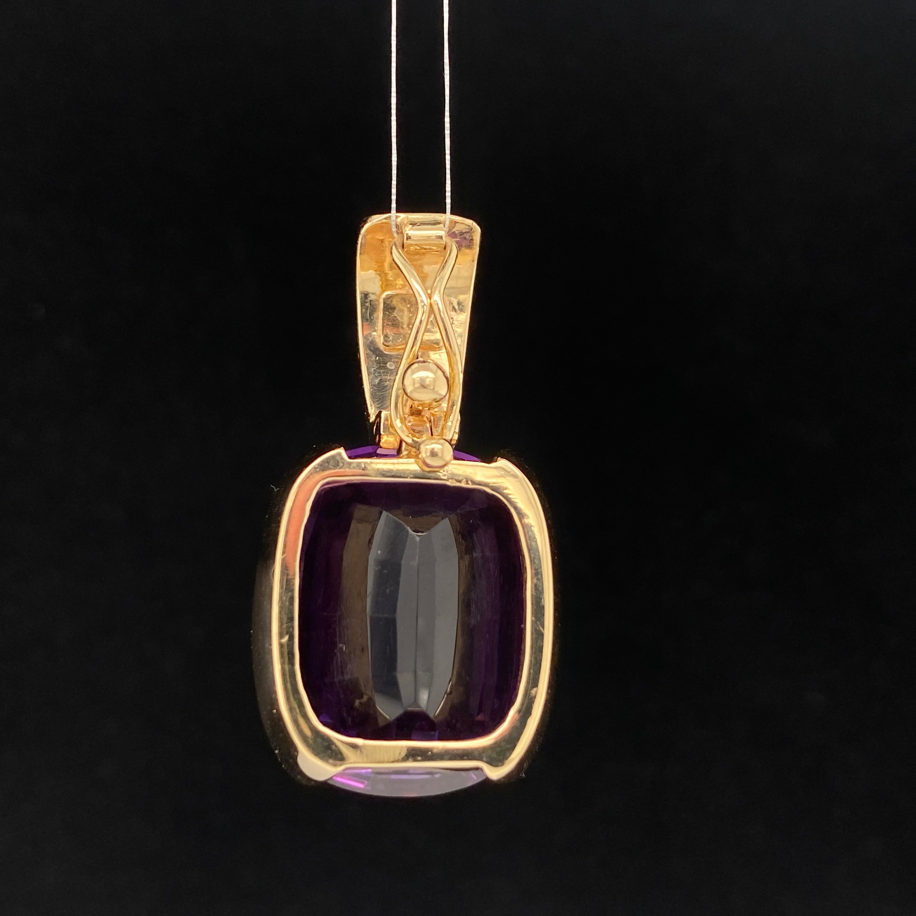 Zia pendant featuring amethyst and diamonds