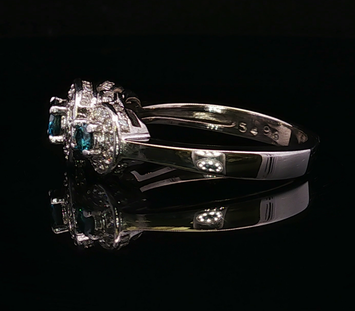 Celineas 14KW Blue & White Diamond Three Stone Ring