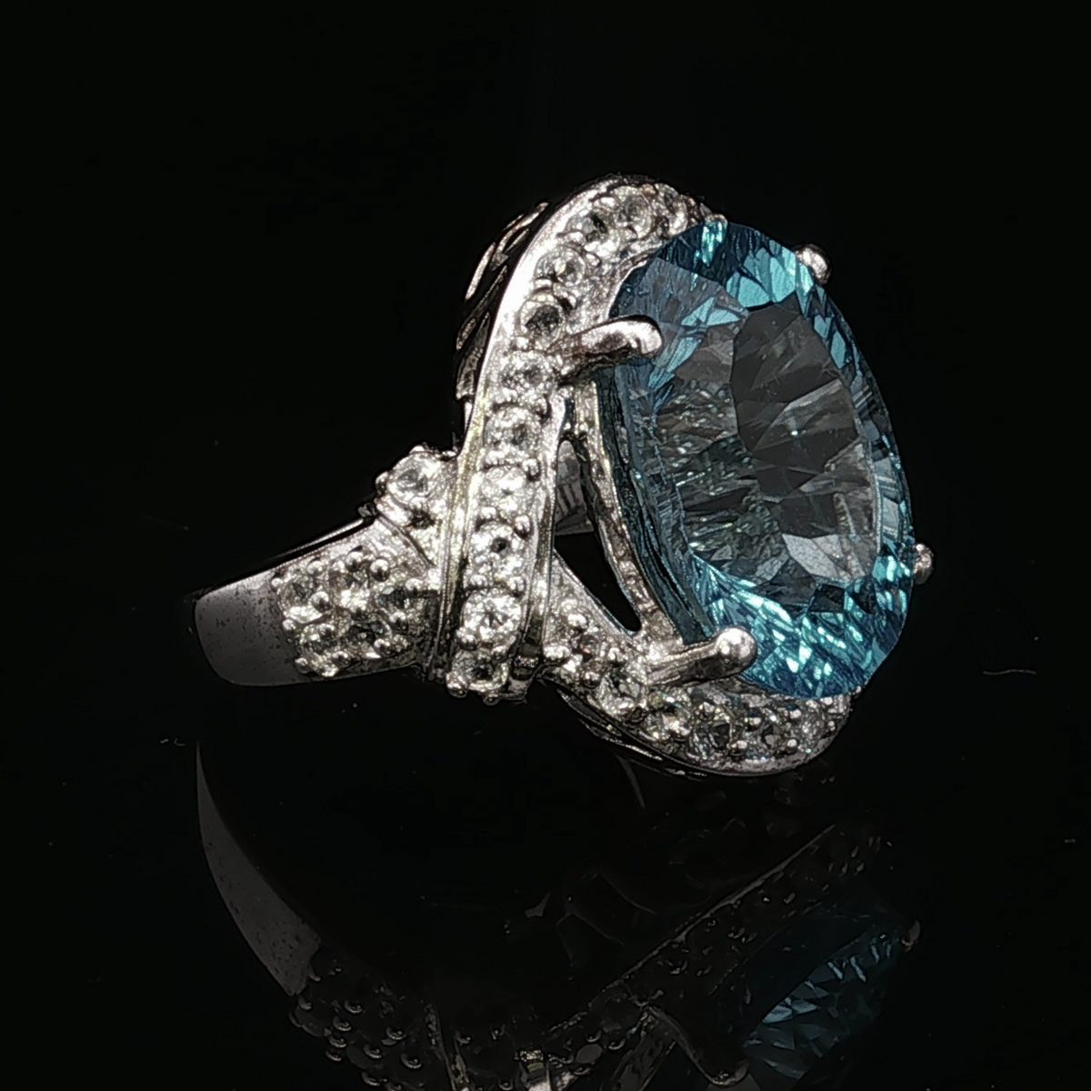 Winifreda Sterling Silver Blue Topaz Halo Ring