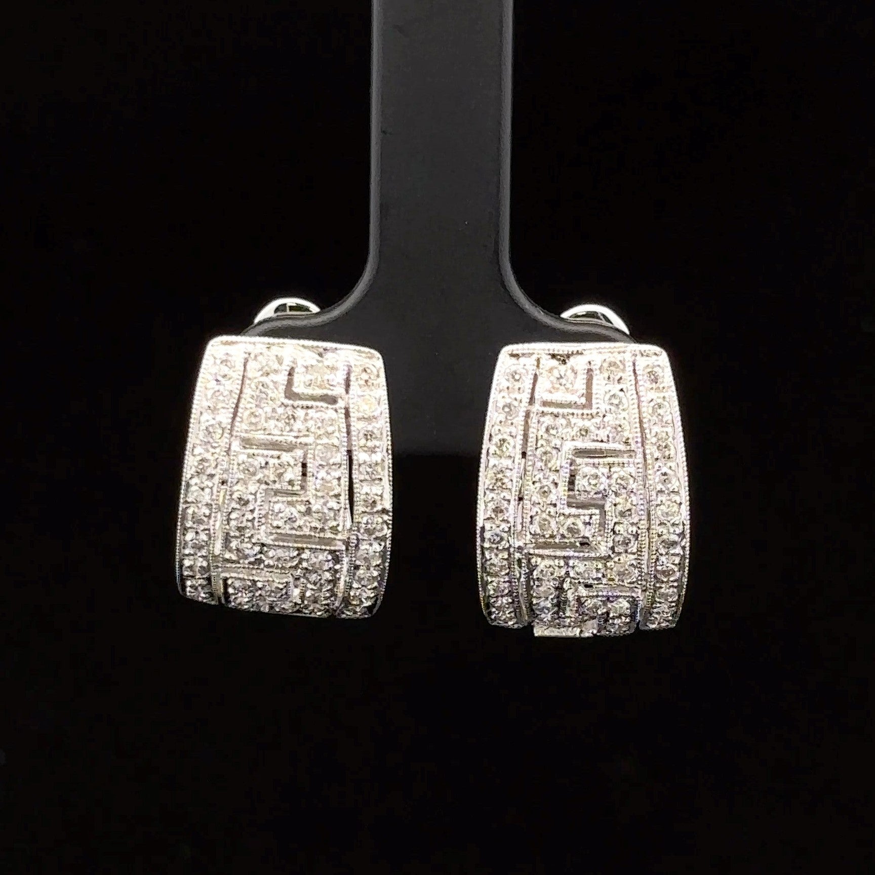 White gold hoop earrings with diamonds