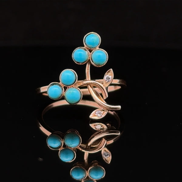 Yellow 14K artisan ring with turquoise flower