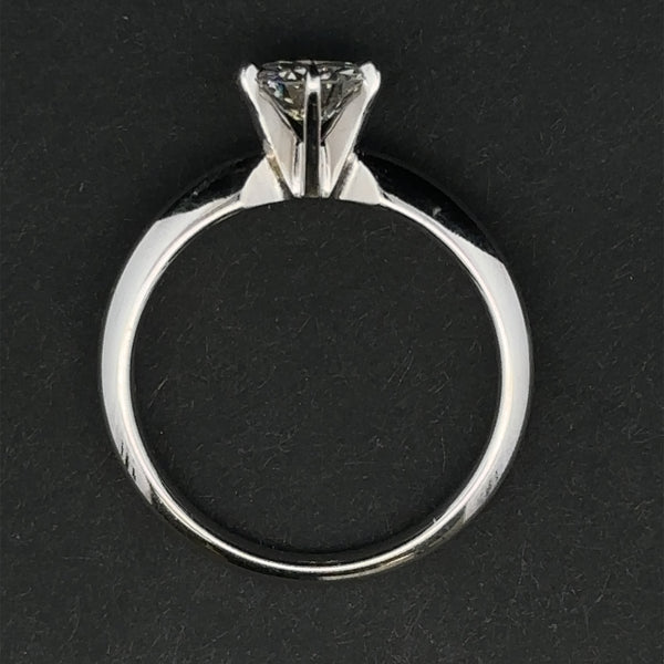Alt Tag 2: 0.93ct F I1 round white diamond in Serenity engagement ring.