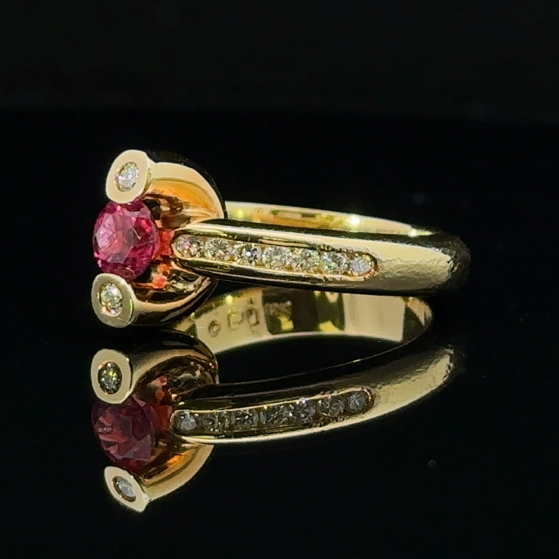 Pink tourmaline and diamond cluster ring
