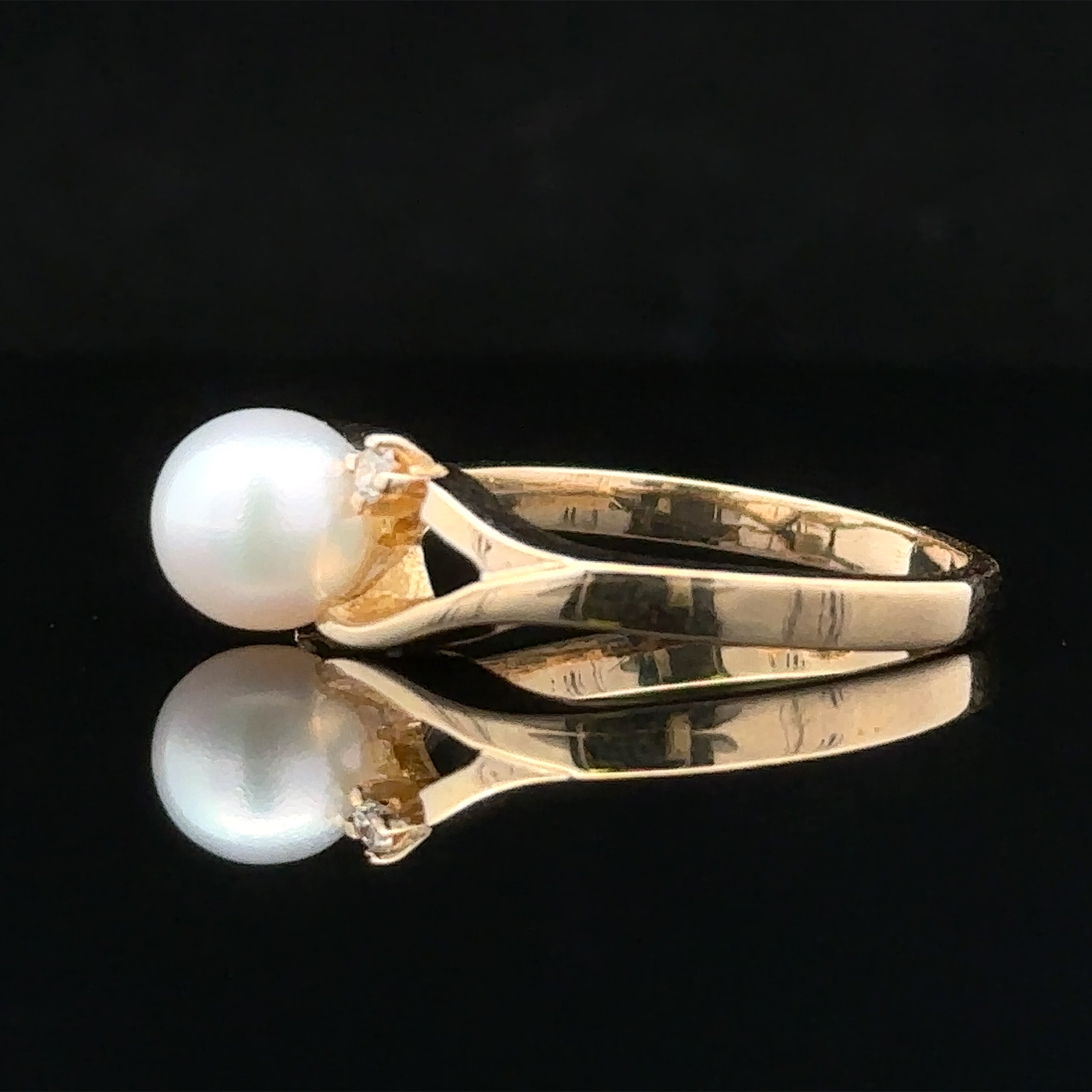 Yellow gold pearl and diamond ring
