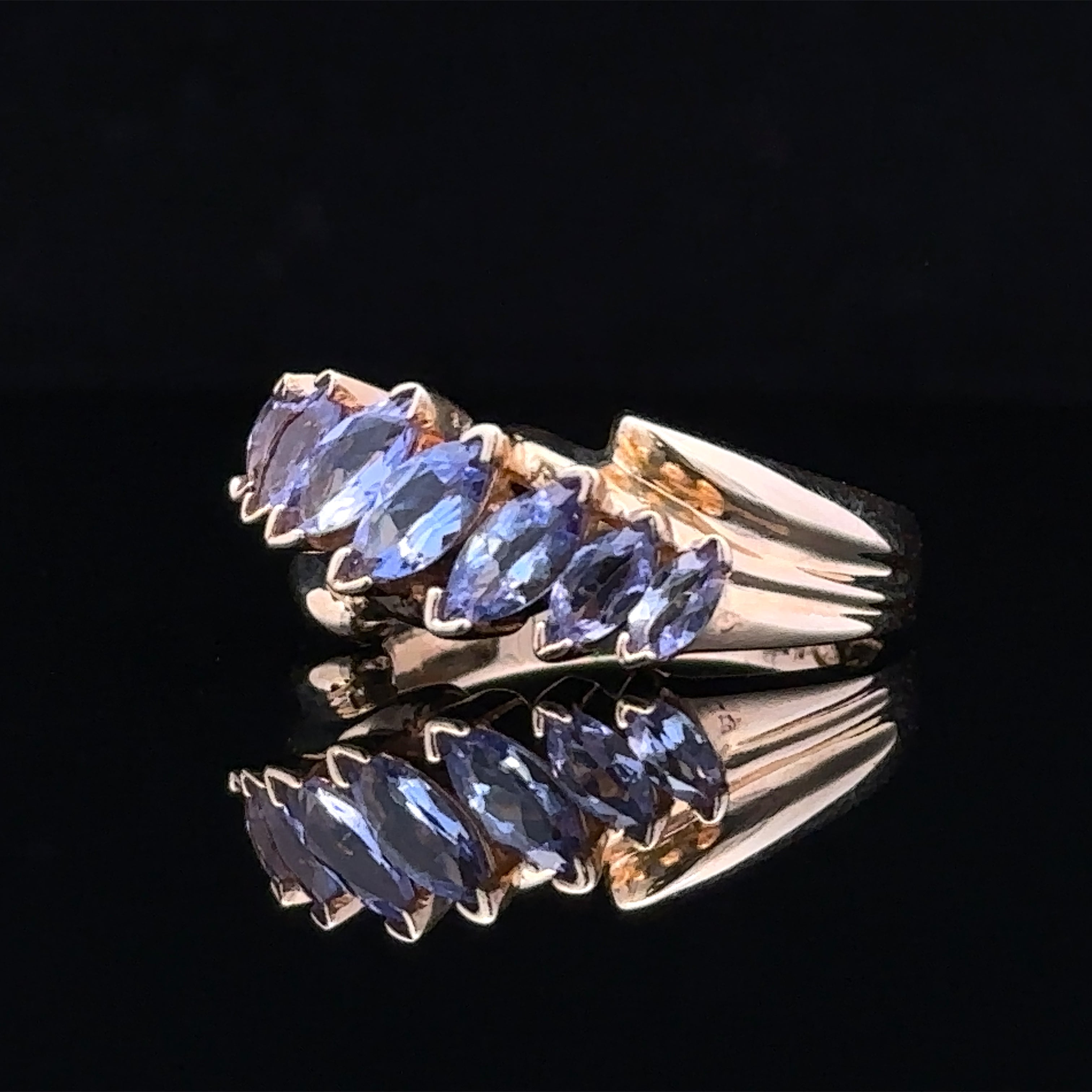 tanzanite 7-stone ring in 14K yellow gold