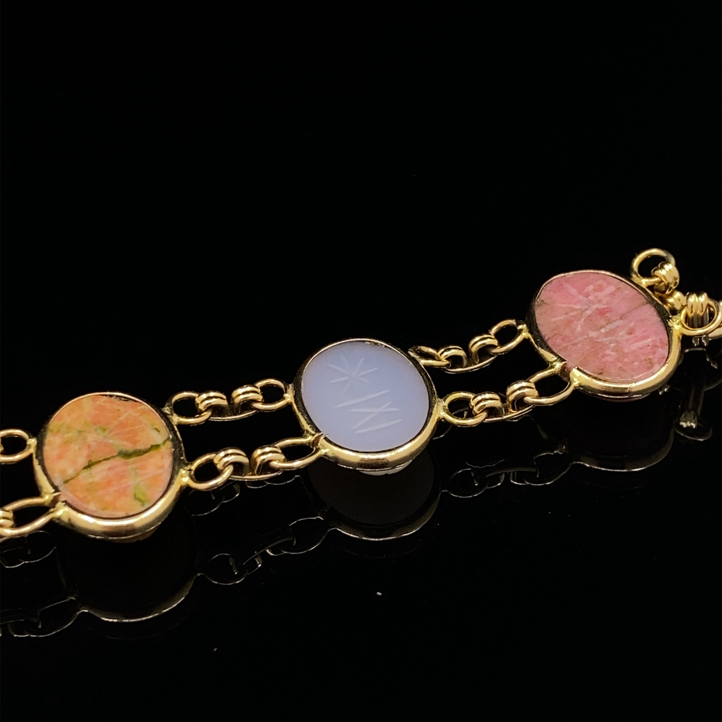 7-inch yellow gold bracelet with Scarab gemstones