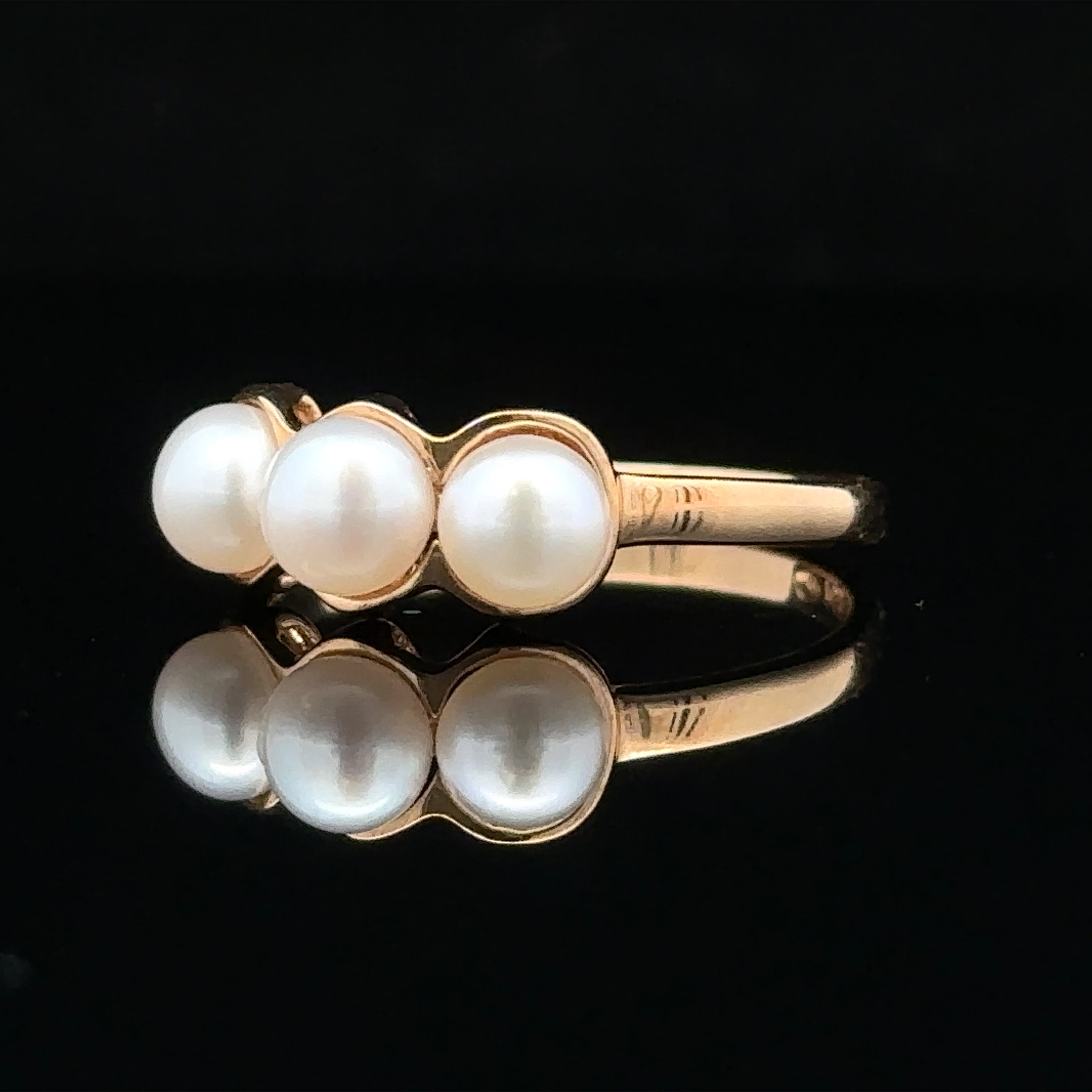 14K yellow gold ring with triple pearl design
