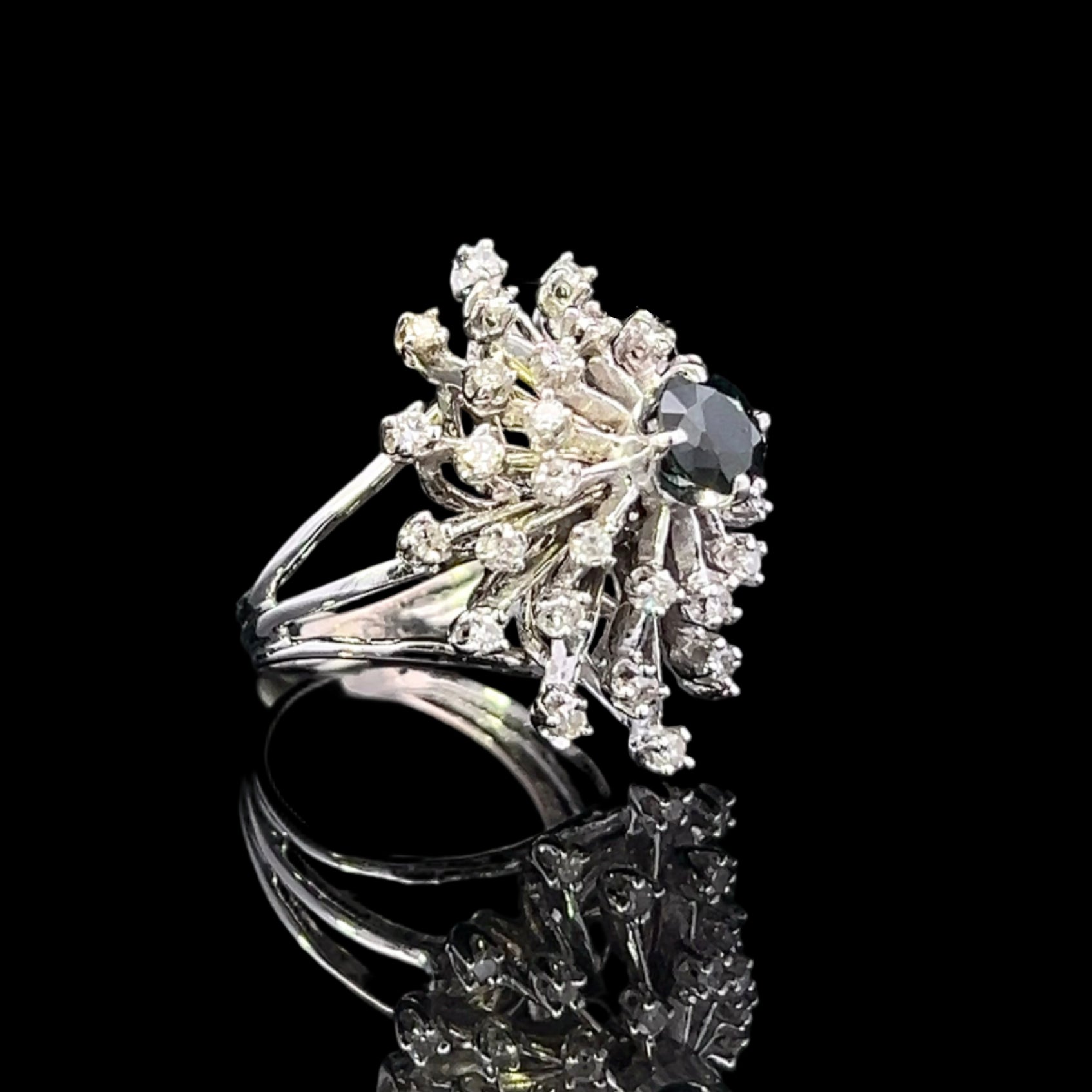 Diamant ring with black gemstone on a black background