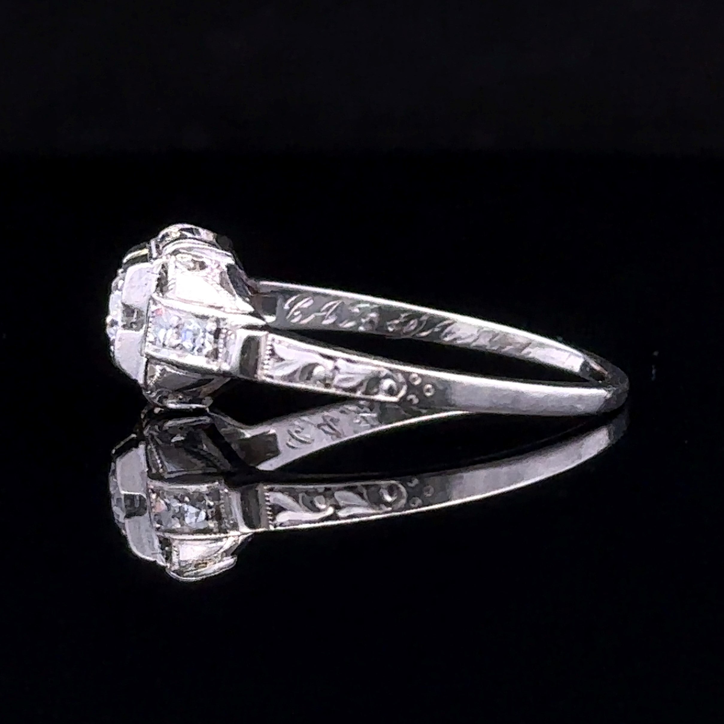 Vera White Platinum Engagement Ring with 7 Stones