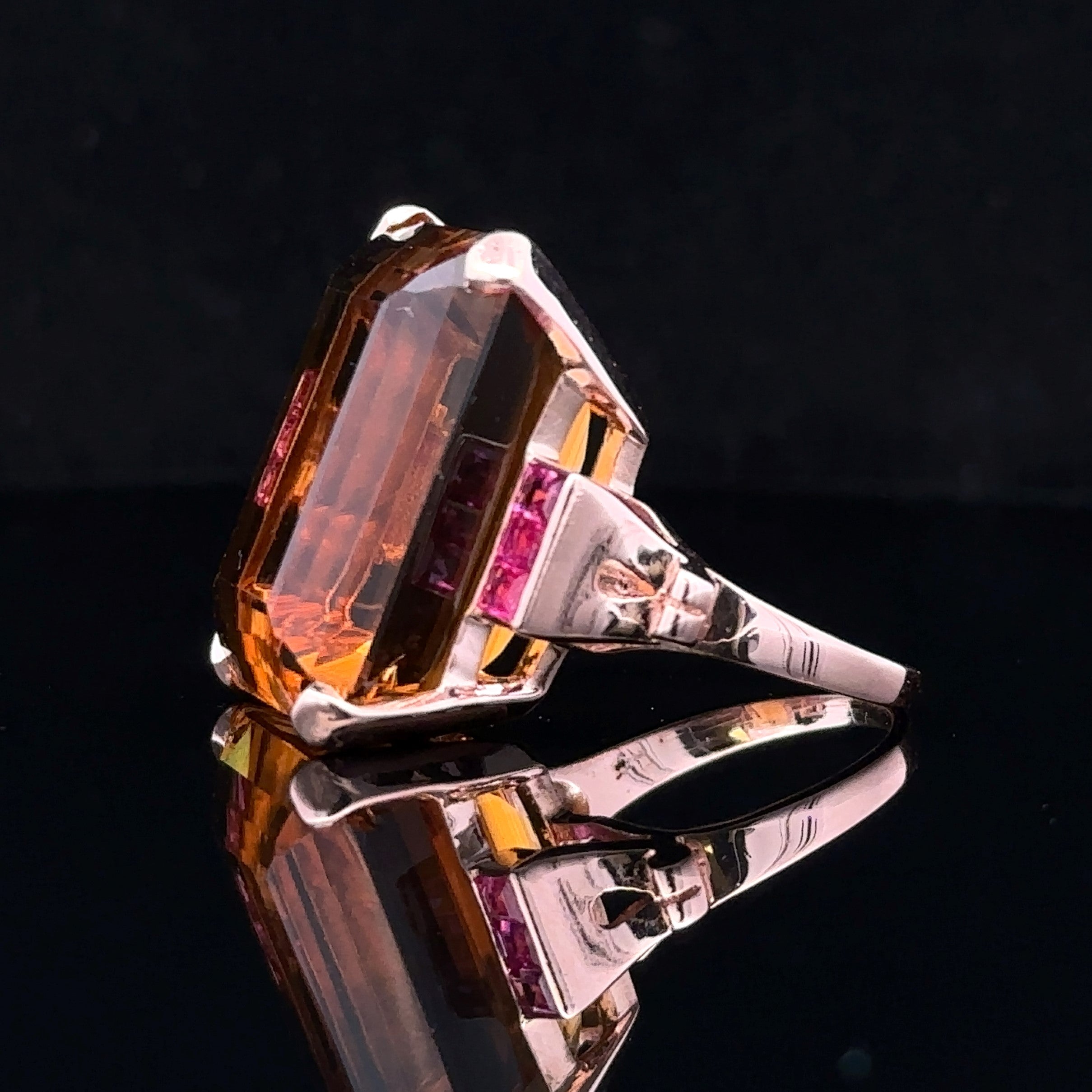 Emerald-cut citrine ring with ruby accents
