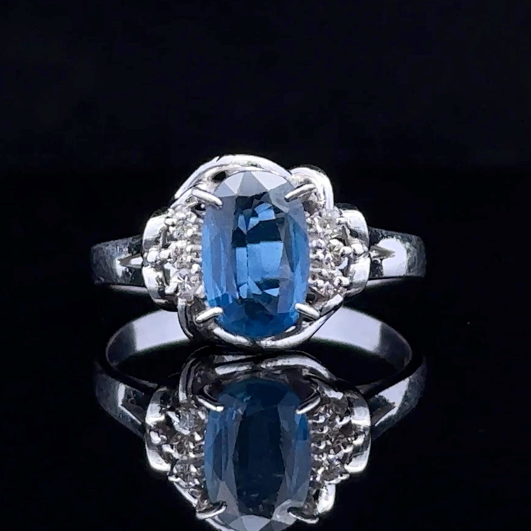 Monroe platinum ring with oval sapphire and diamonds
