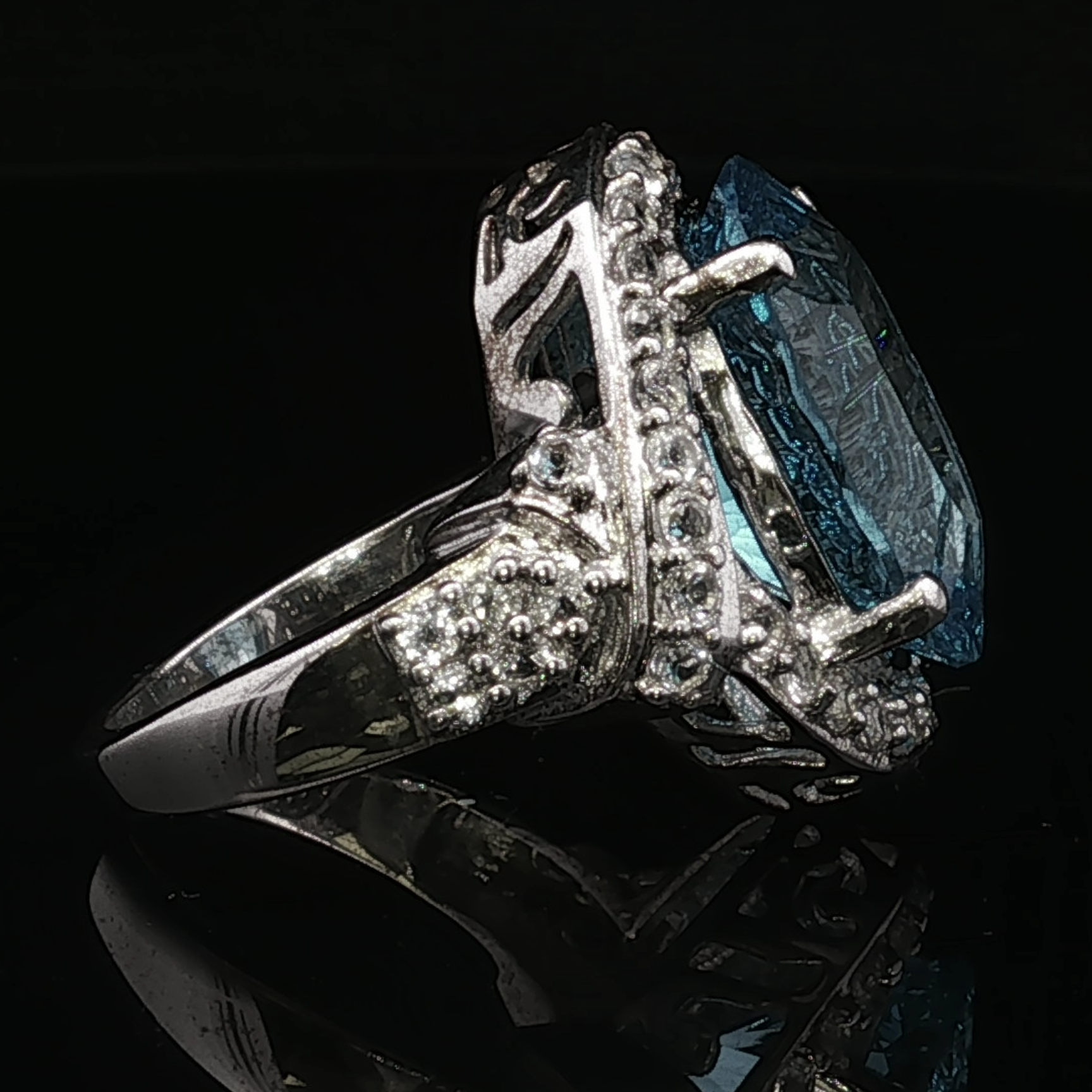 Winifreda Sterling Silver Blue Topaz Halo Ring