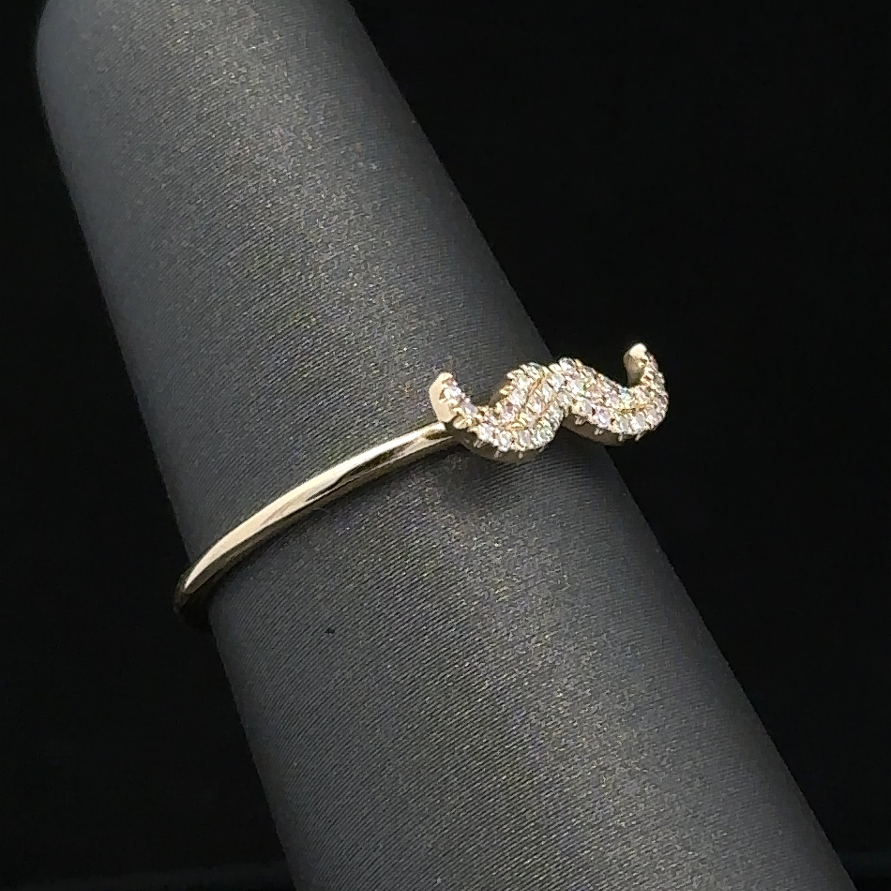 Fabio 14K textured mustache ring
