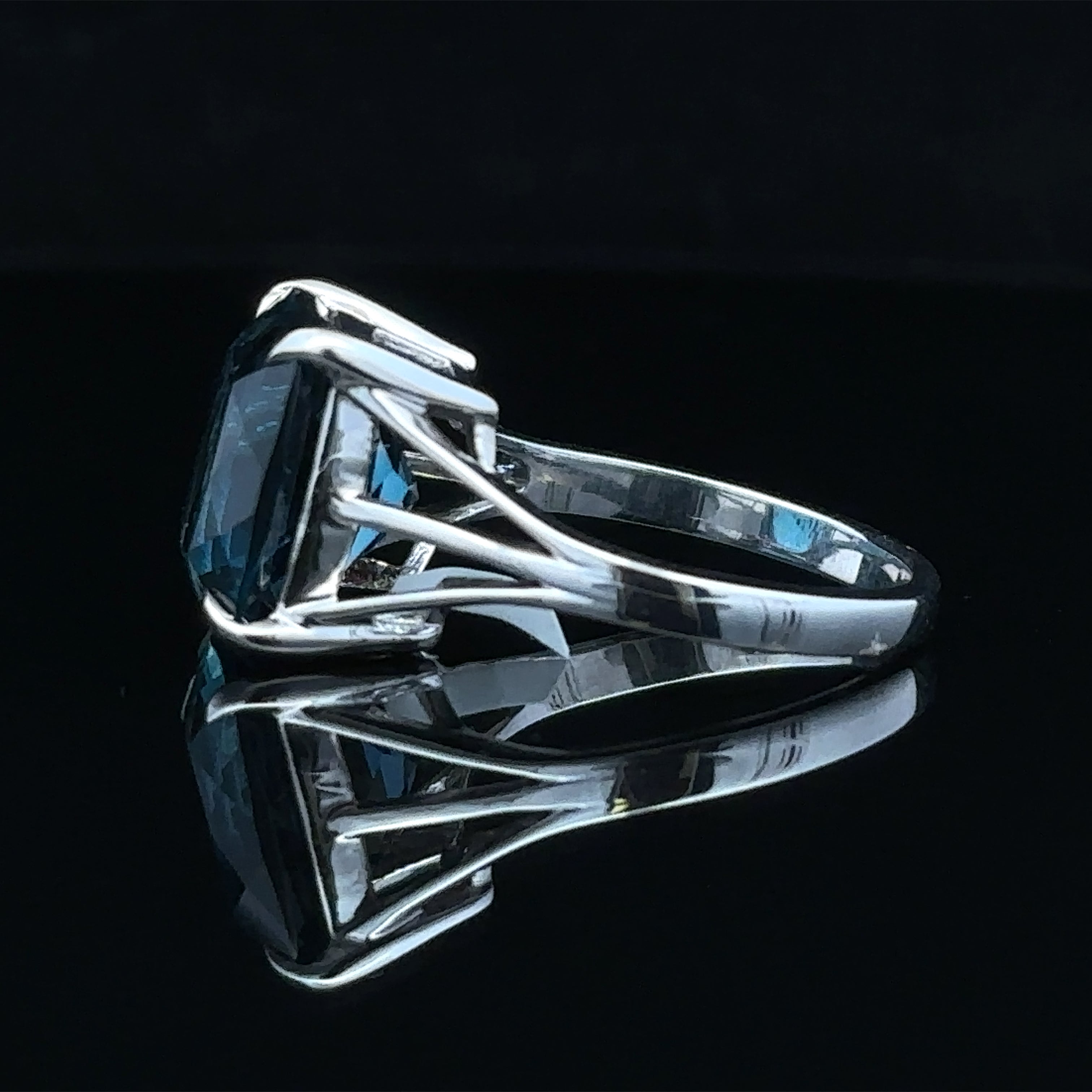 Sleek silver ring with London Blue Topaz stone
