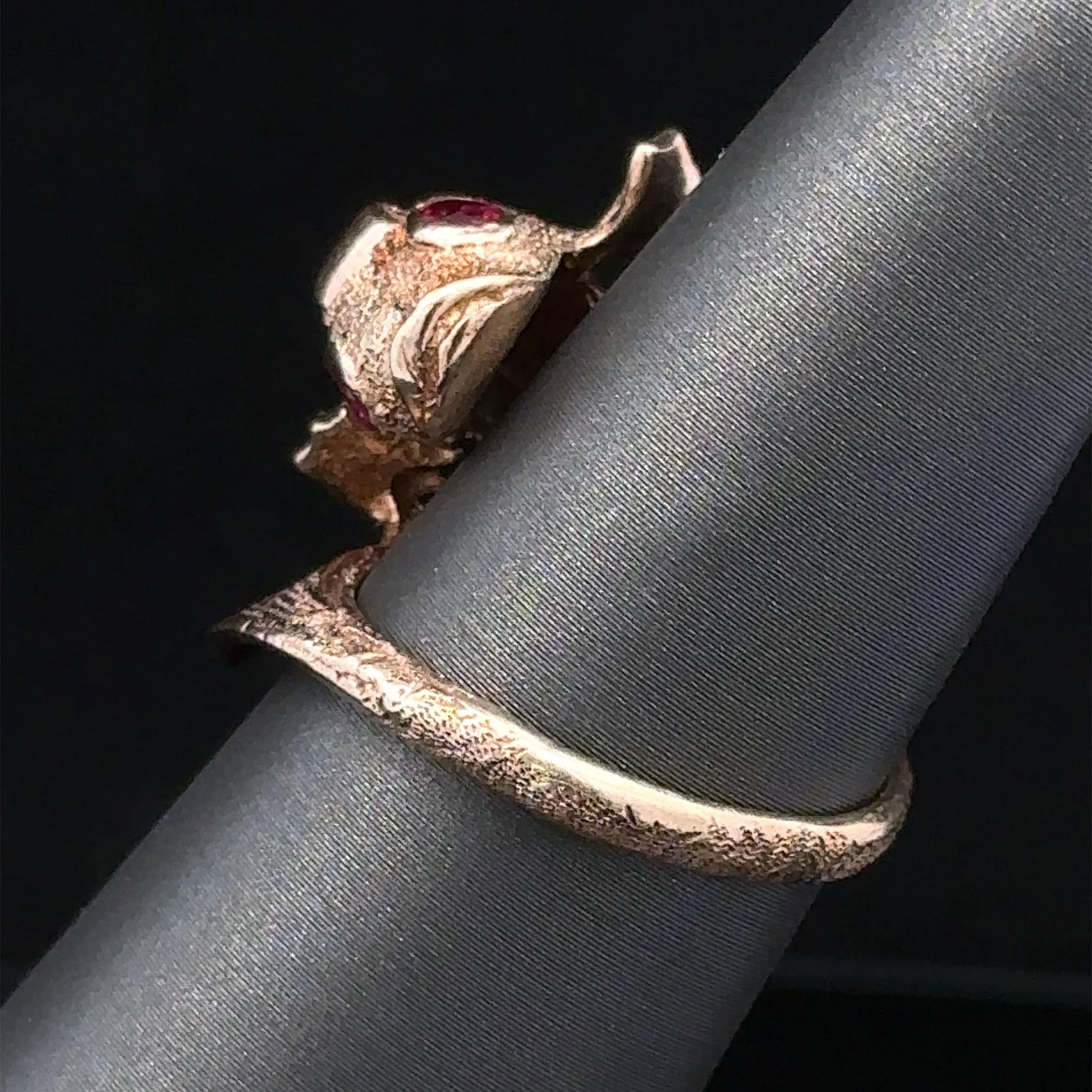  fish motif ring with ruby eye