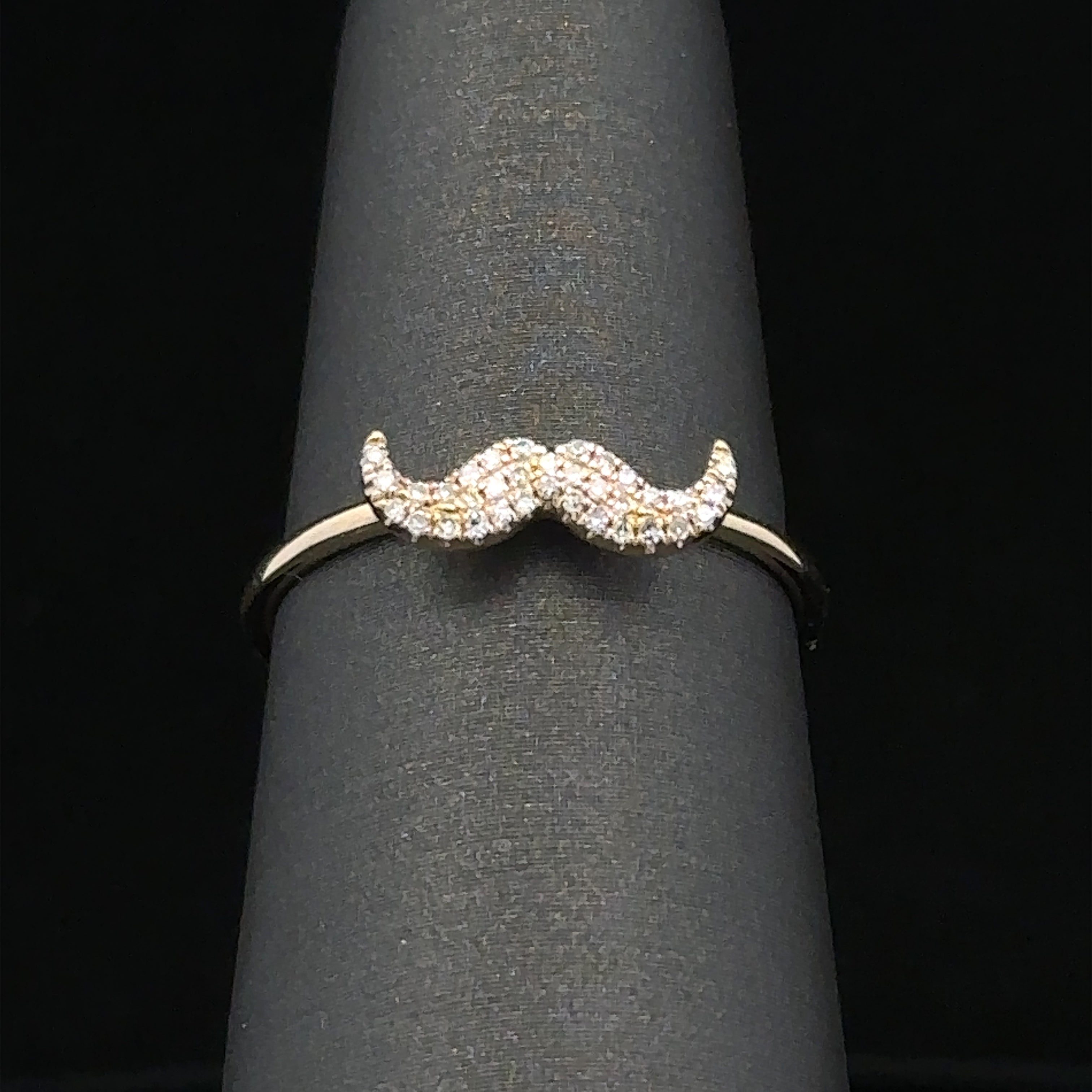 Yellow gold mustache ring with diamonds