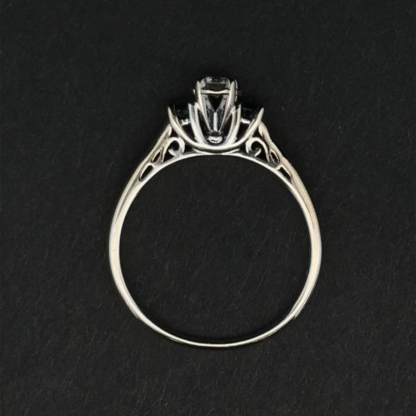 Elegant design of Taliyah Ring in 14K white gold, showcasing the blend of diamond and sapphires, size 8.