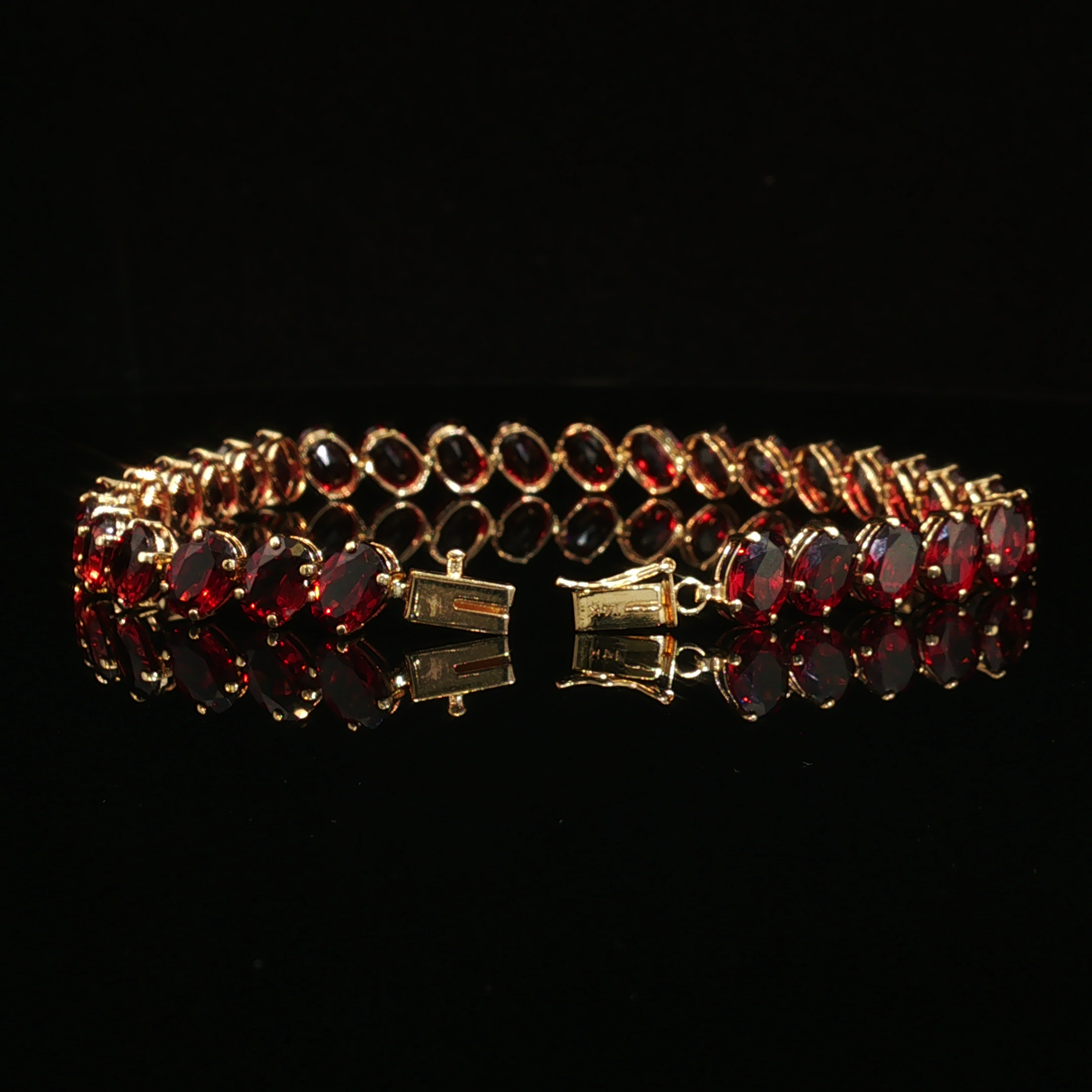 Philipa 14k Yellow Gold Oval Garnet Bracelet 27.9ctw