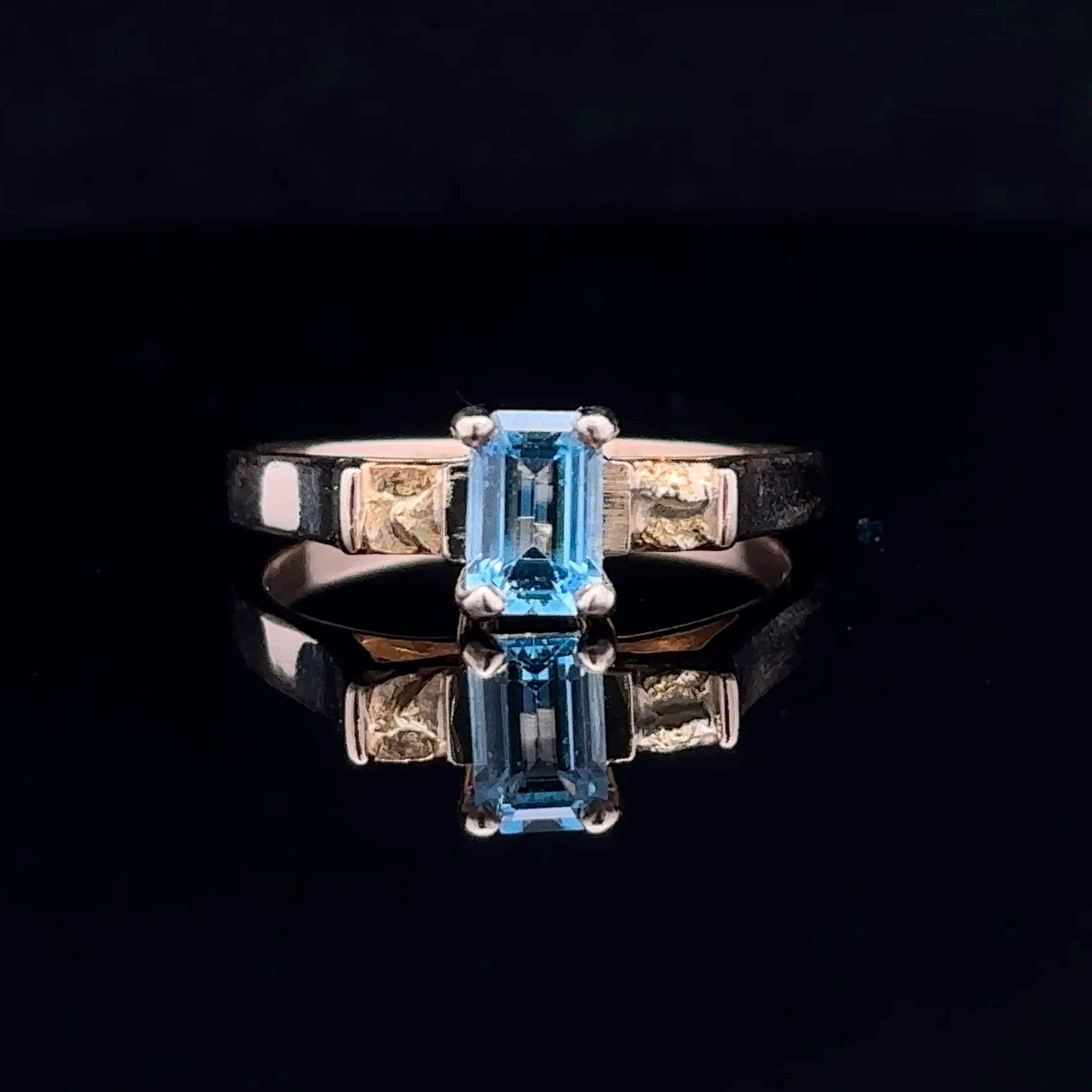 Madison 14K yellow gold ring with emerald-cut blue topaz
