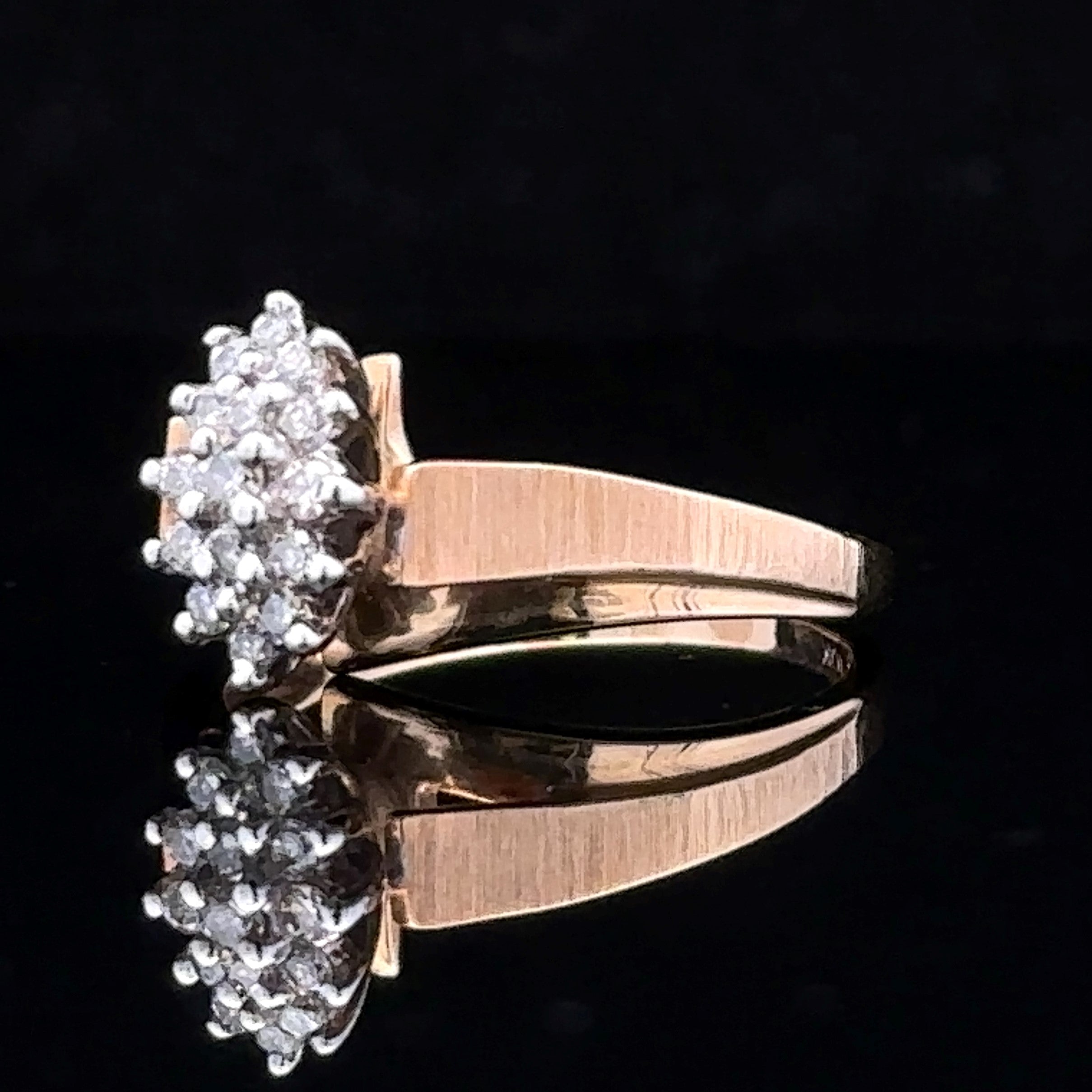 Close-up of textured detailing on Jenesis double halo ring